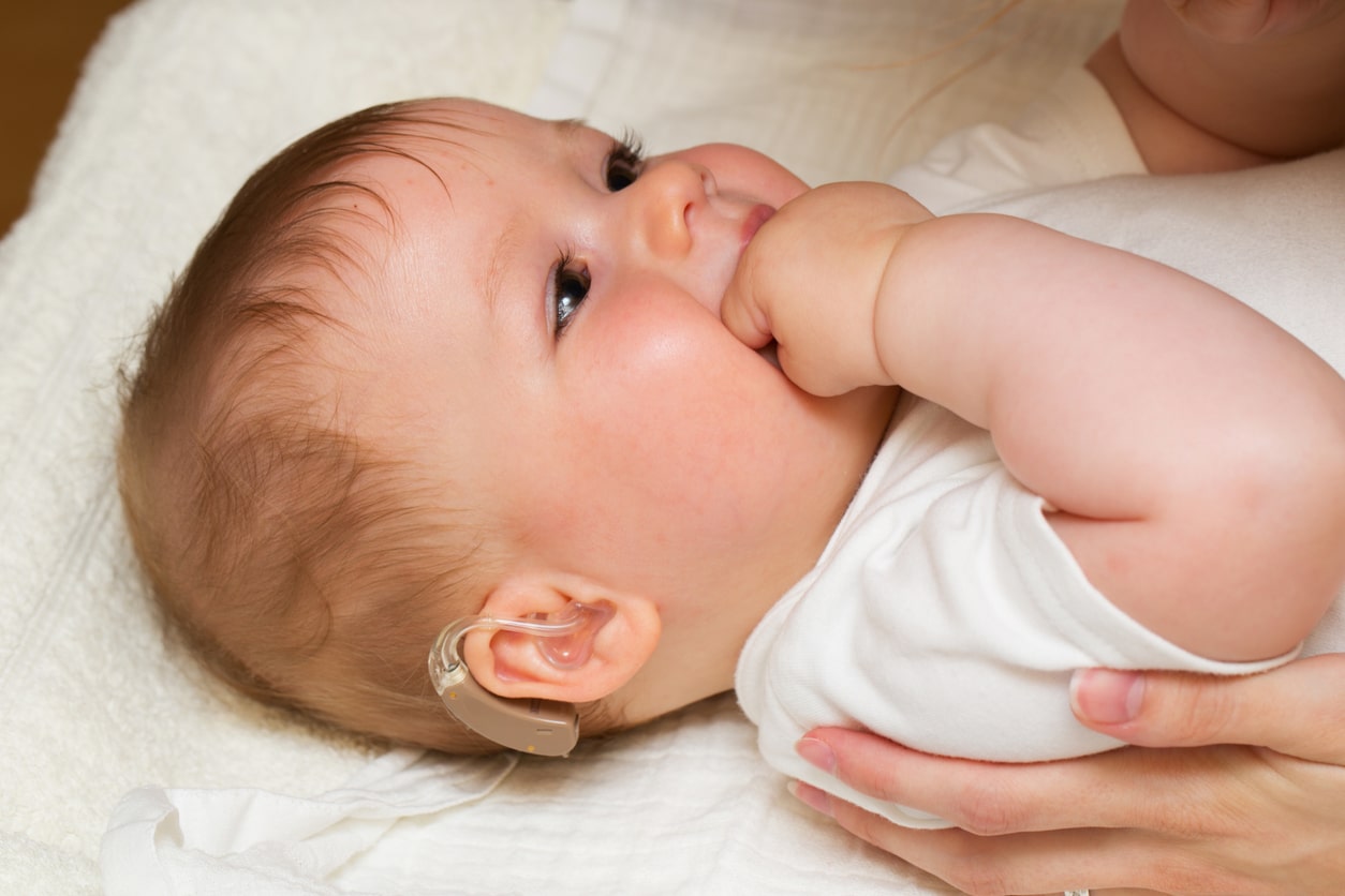 Baby with hearing aids